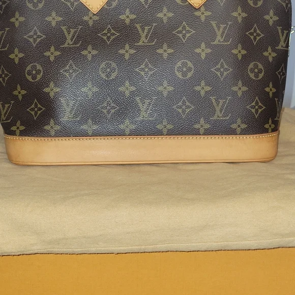 LOUIS VUITTON Alma monogram - Picture 7 of 16